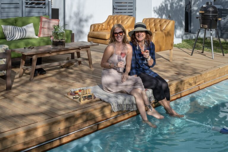 Elegant automated sliding deck pool cover installed by Geani Gold in a Stellenbosch luxury home, blending premium materials with seamless outdoor design.