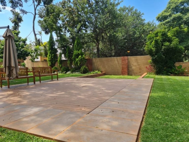 Geani Gold custom-designed pool with automated sliding deck cover in Pretoria, combining luxury aesthetics with innovative safety and space-saving features.