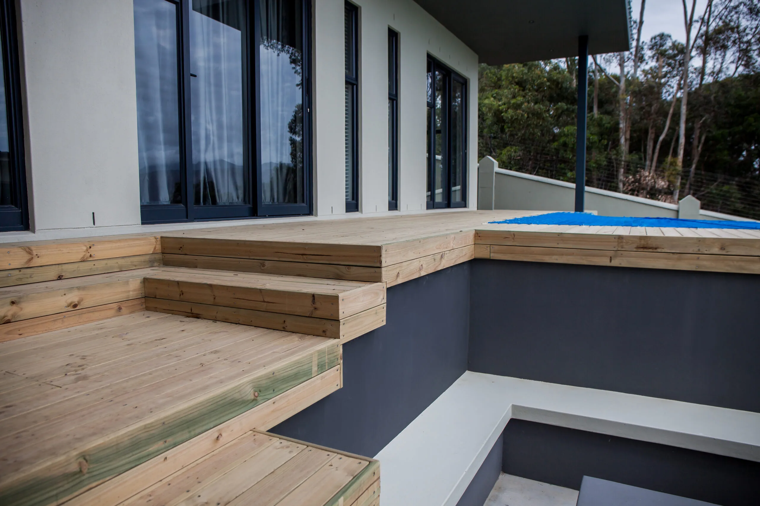Composite decking with seamless indoor-outdoor flow by Geani Gold in South Africa.