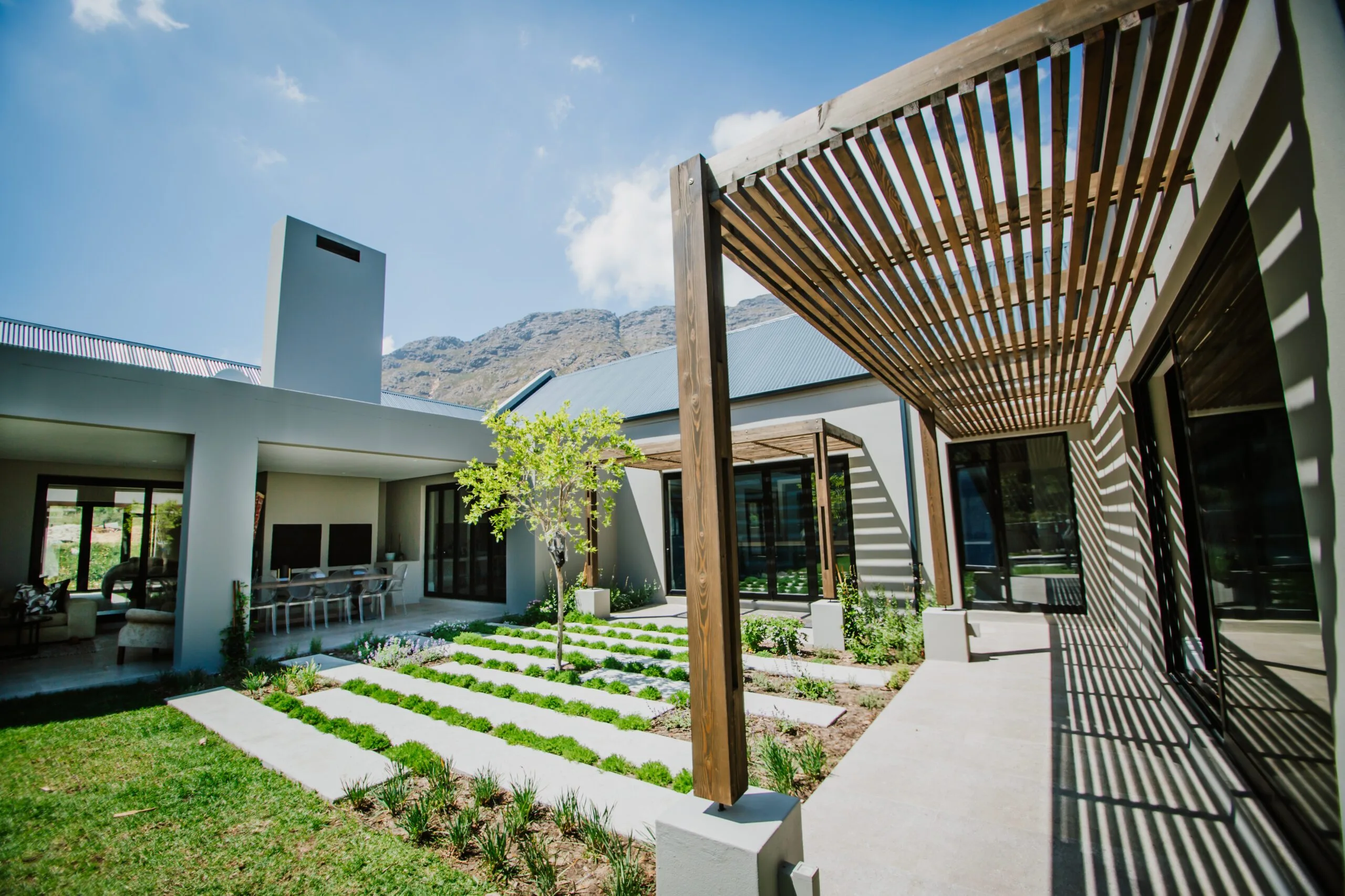 Wood pergola installed by Geani Gold