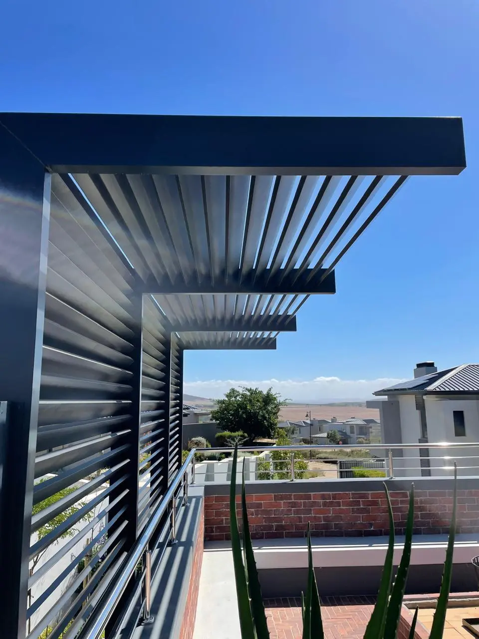 Adjustable louvre awning and pergolas installed by Geani Gold South Africa