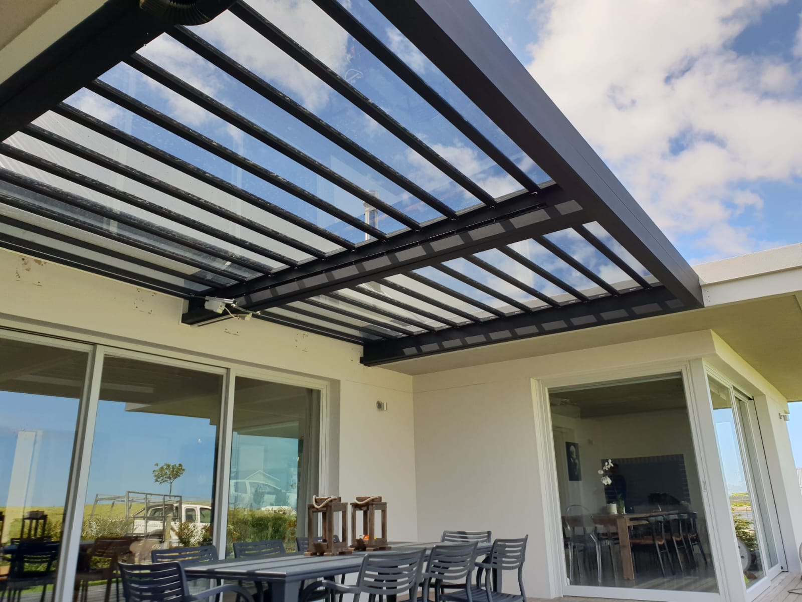 water and weatherproof pergola system installed and manufactured by geanigold in south africa